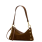 A brown suede shoulder bag with gold-tone hardware and a long shoulder strap.