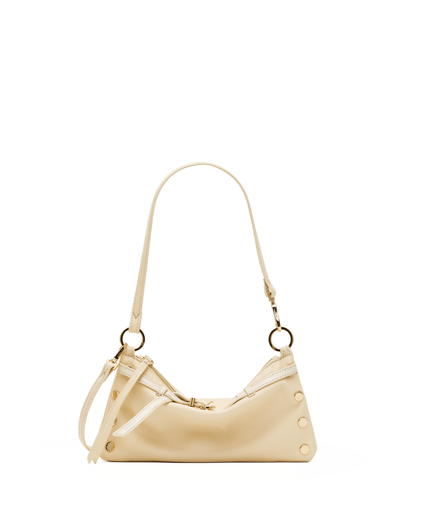 A cream-colored leather shoulder bag with a crescent shape, gold-tone hardware, and a matching shoulder strap, shown against a plain white background.