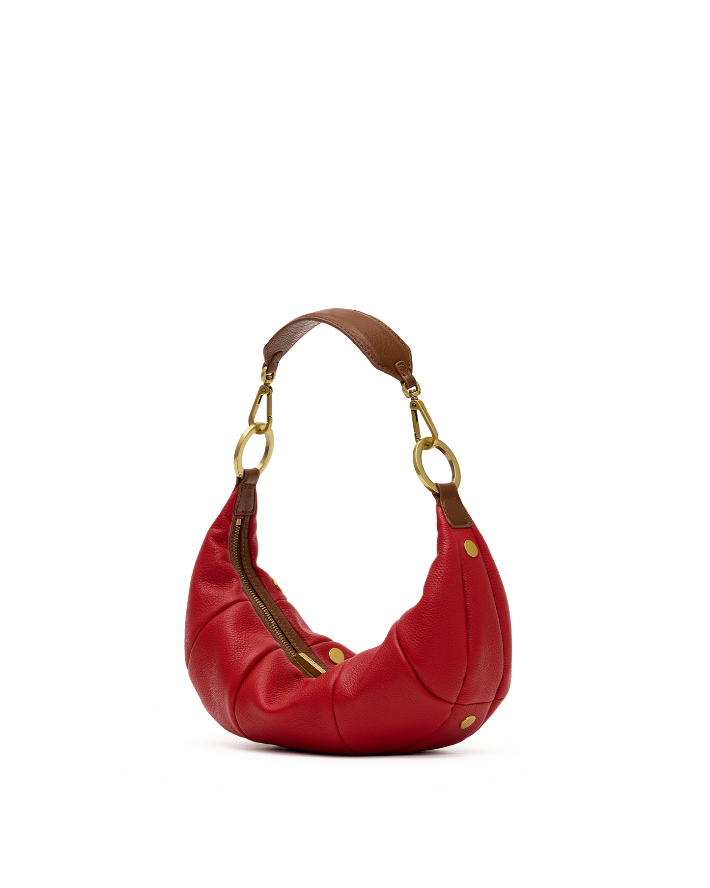 A red leather crescent-shaped shoulder bag with a brown leather handle and gold-tone hardware, shown on a plain white background.