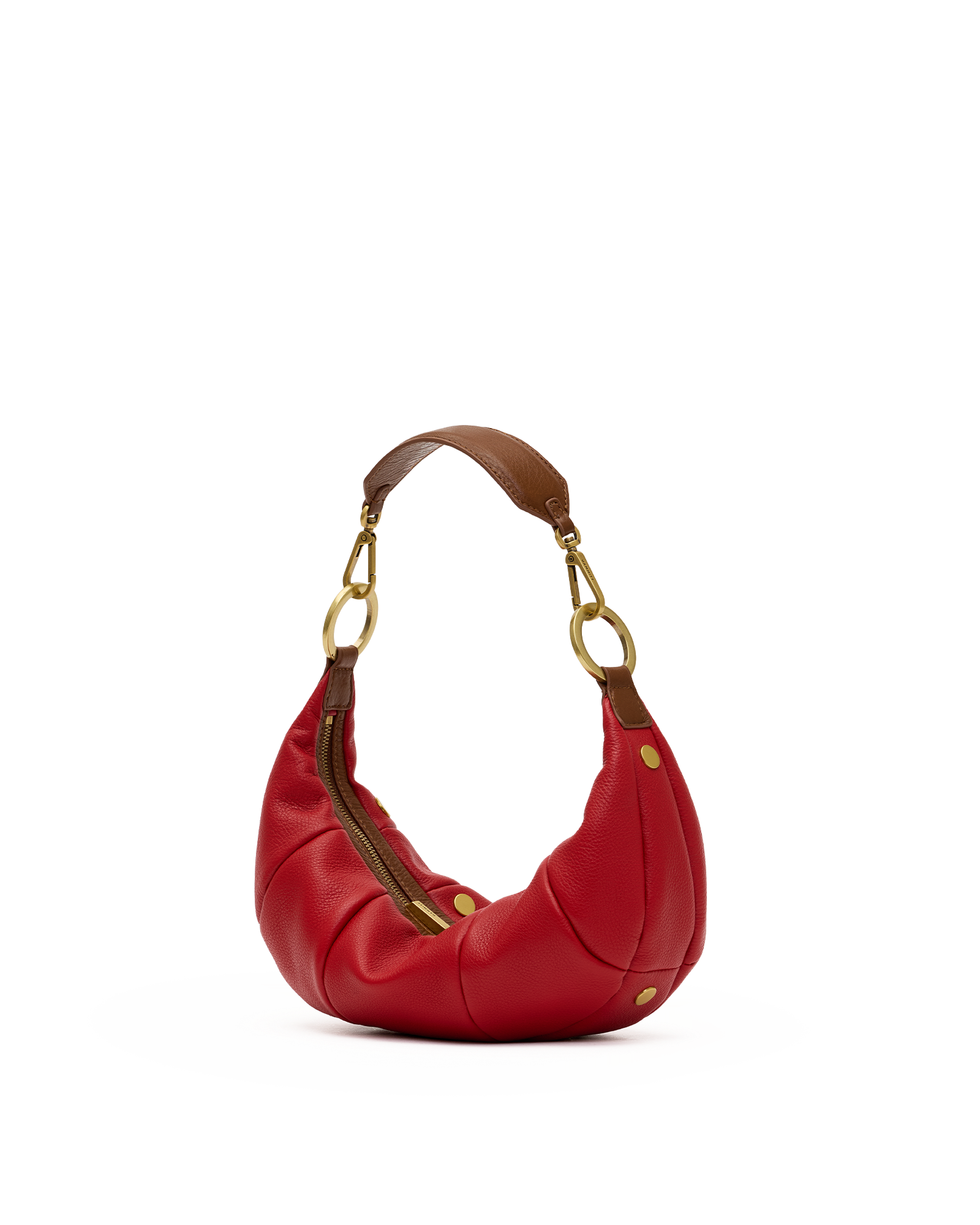 A red leather crescent-shaped shoulder bag with a brown leather handle and gold-tone hardware, shown on a plain white background.