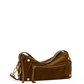 A brown suede shoulder bag with gold-tone hardware, a front zippered pocket, and a matching brown leather strap, shown against a plain white background.