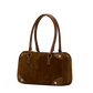 A brown suede and leather handbag with double top handles, gold-tone hardware, and corner protectors, shown on a plain white background.