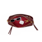 A burgundy leather pouch shown open on a white background, revealing a red interior with gold-tone zipper hardware. White sunglasses, a white earbud case, and two keys are placed inside as styling props.