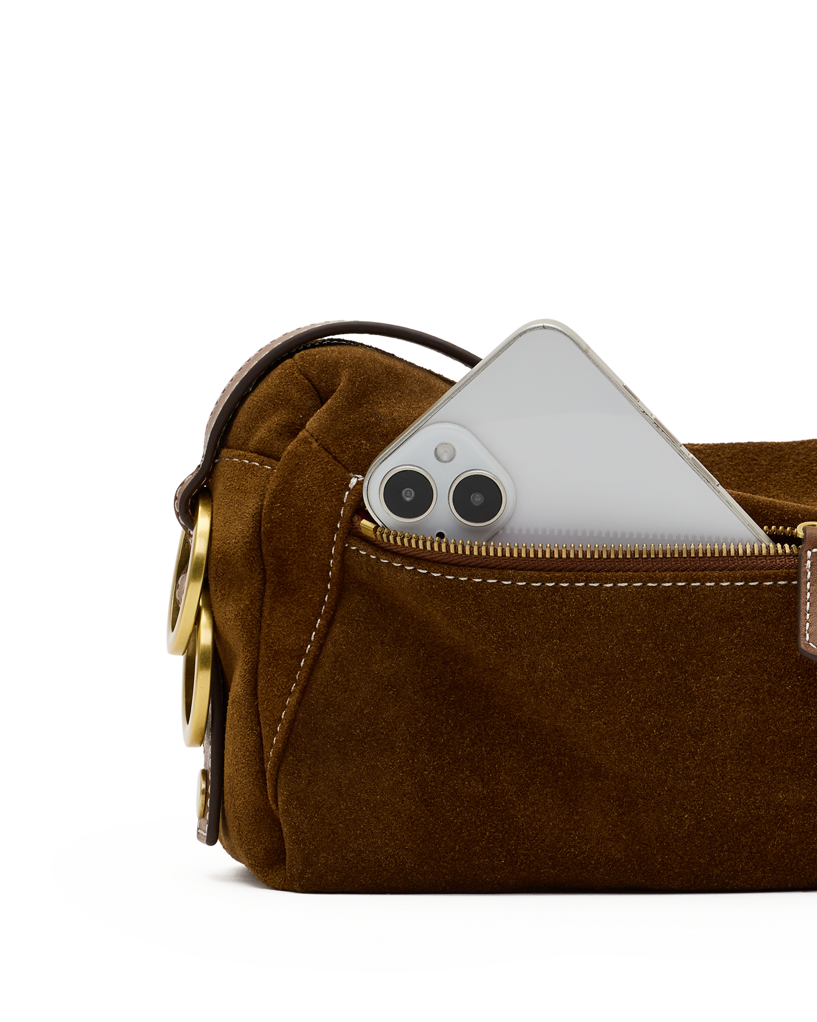 A close-up of a brown suede pouch or small bag with a gold-tone zipper, shown with a silver smartphone partially tucked into the pocket against a white background.