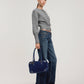 Model height is 5'10''