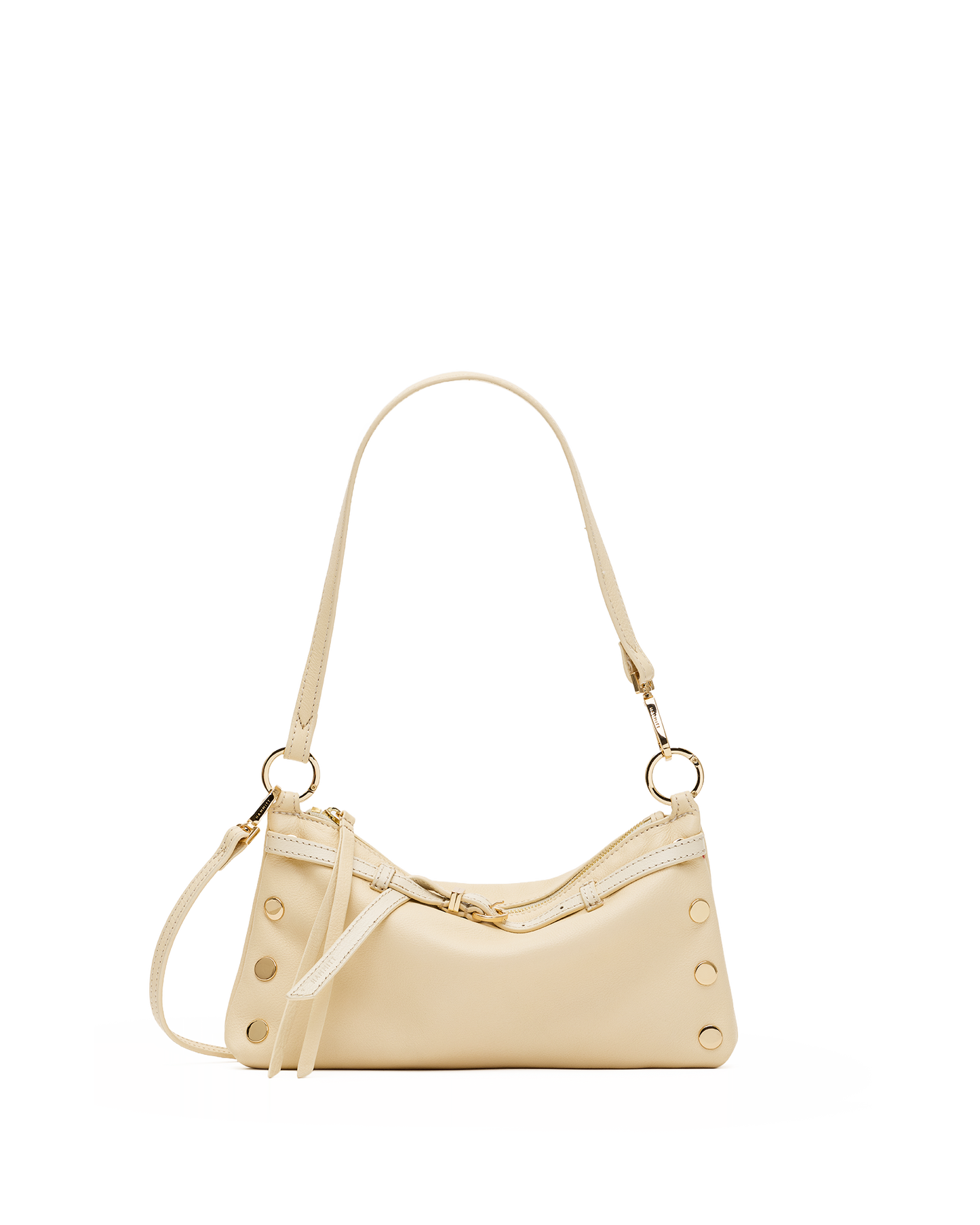 A cream-colored faux leather shoulder bag with gold-tone hardware, featuring a crescent-shaped body, decorative rivets, and a matching shoulder strap, shown against a plain white background.