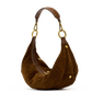 A brown suede crescent-shaped shoulder bag with gold-tone hardware, featuring a matching brown leather strap and gold snap details, set against a plain white background.