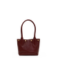 A dark burgundy leather tote bag with double top handles and three gold-tone metal studs on the front, shown against a plain white background.