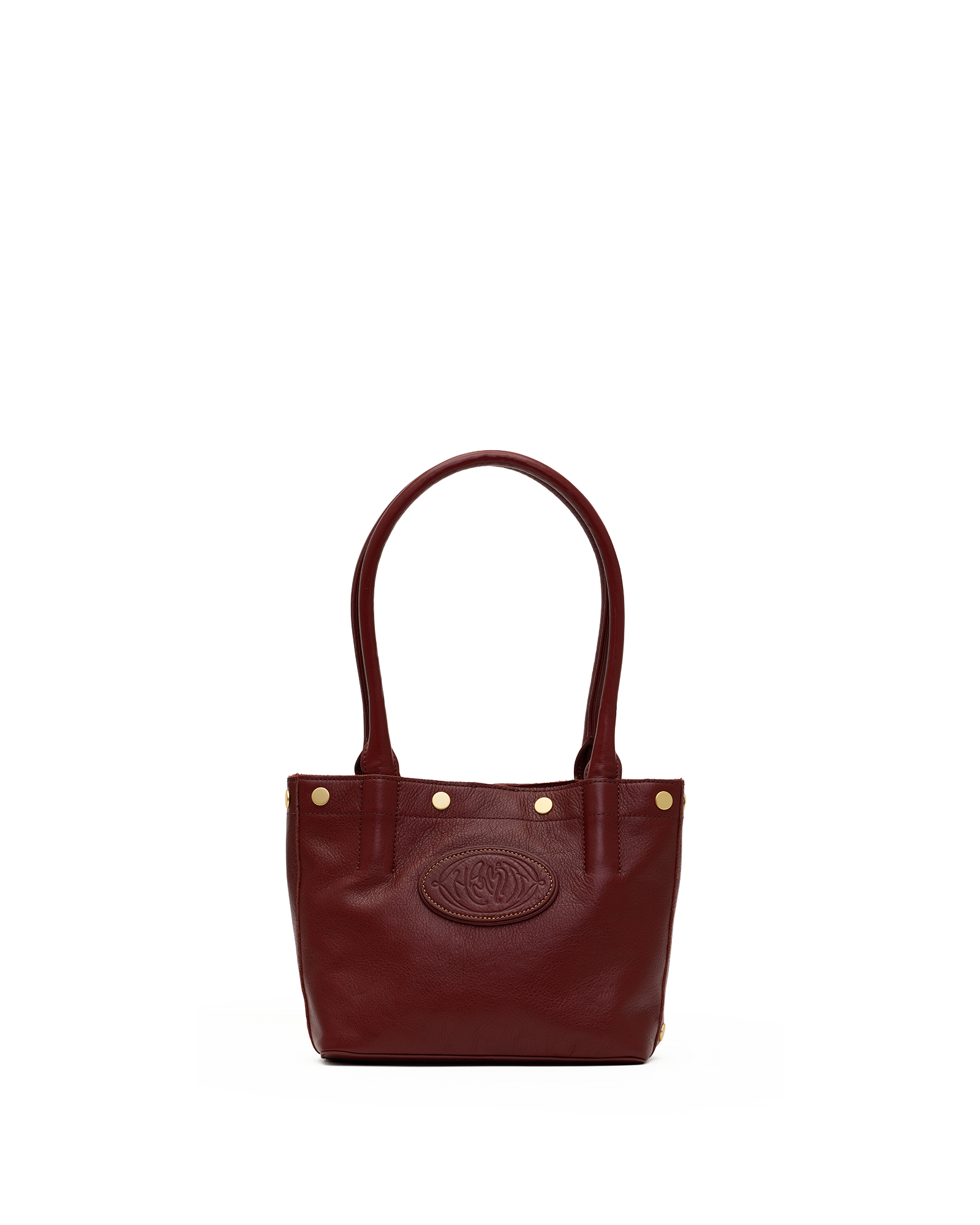 A dark burgundy leather tote bag with double top handles, gold-tone hardware, and an embossed oval logo on the front, shown against a plain white background.