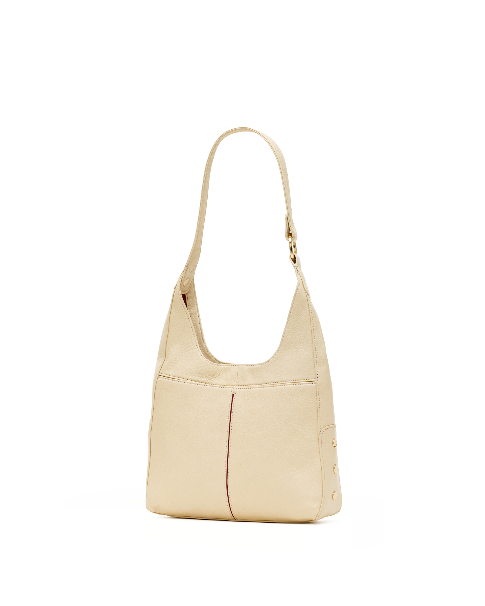 A light beige leather shoulder bag with a single strap and gold-tone hardware, shown against a plain white background.