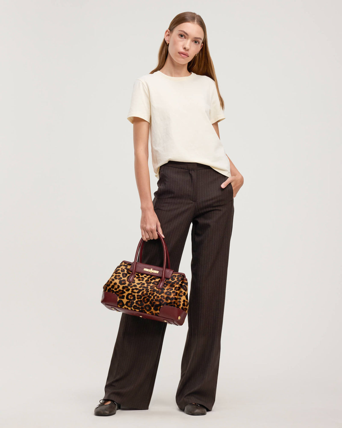 Model height is 5'10''